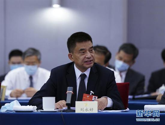  5月23日，全國政協(xié)委員劉永好在政協(xié)聯(lián)組會(huì)上發(fā)言。新華社記者 謝環(huán)馳 攝