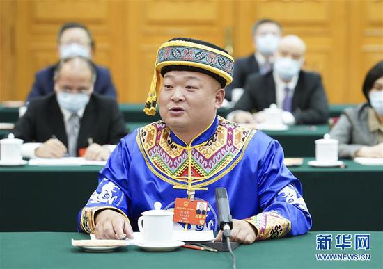  5月24日，全國人大代表宋慶禮參加湖北代表團(tuán)的審議并發(fā)言。新華社記者 黃敬文 攝